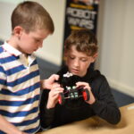 Boys making robot